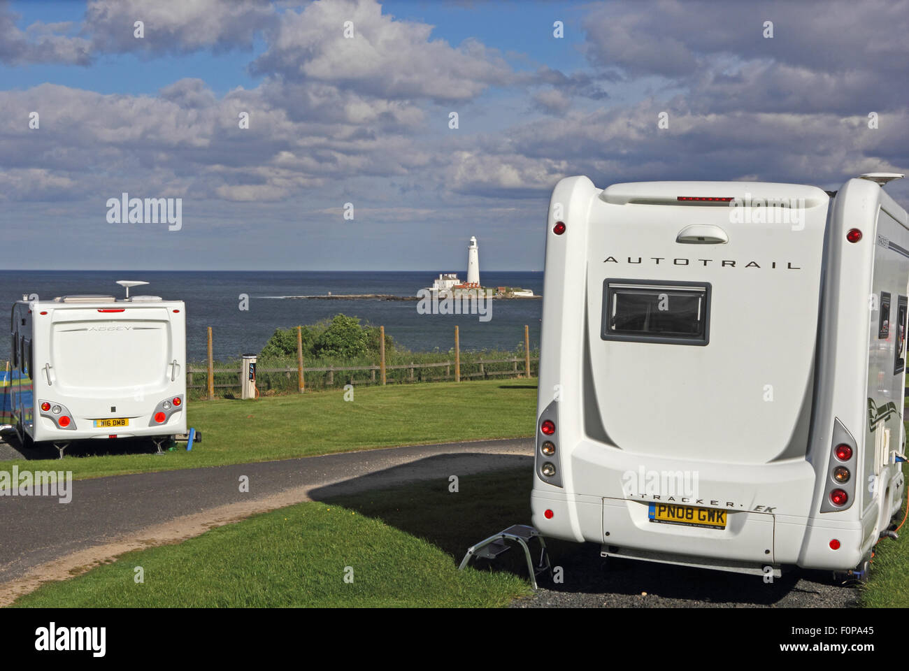 Old Hartley Caravan Club site, with St. Mary's Island and lighthouse in distance, Whitley Bay Stock Photo