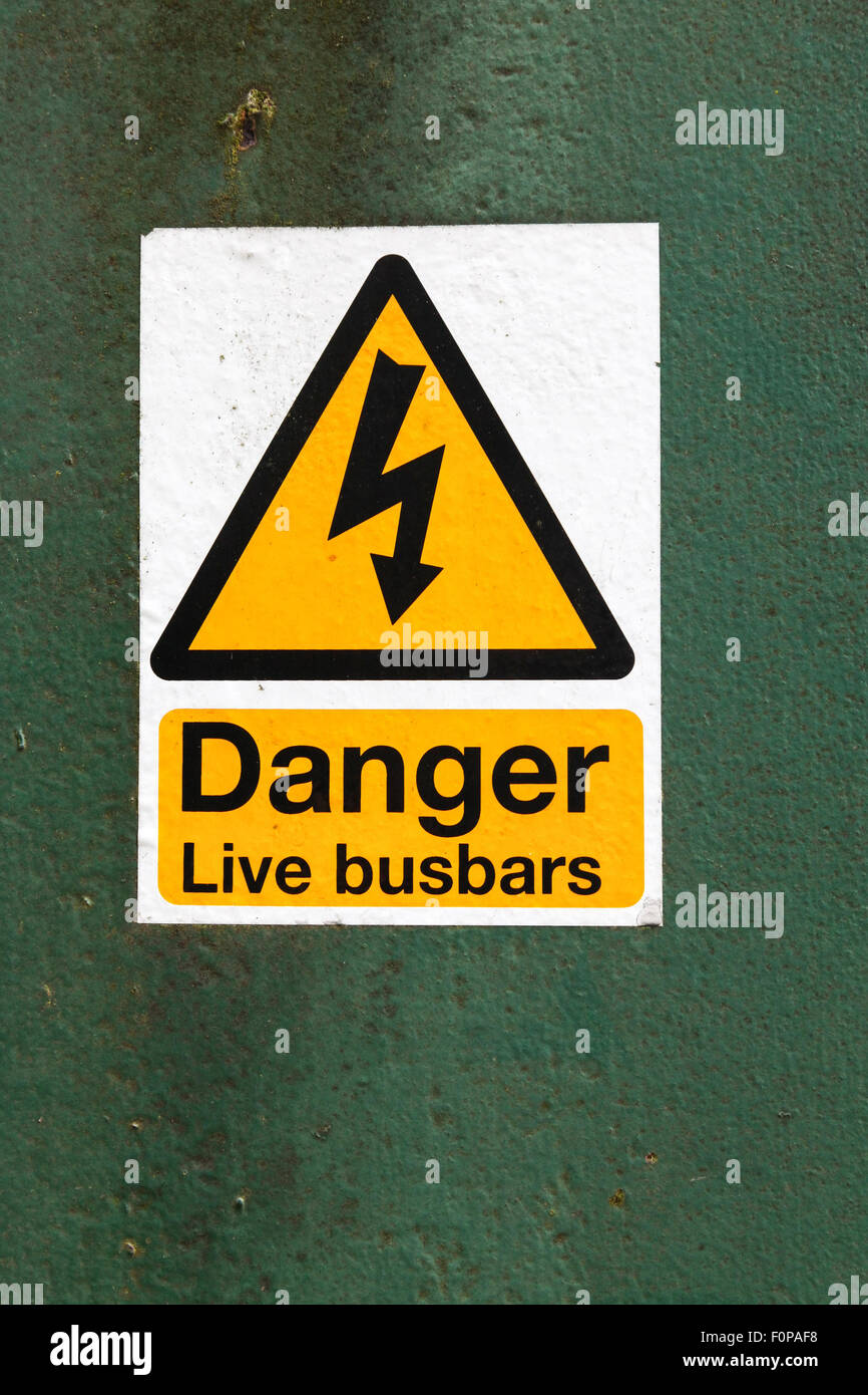 A warning sign saying danger live busbars Stock Photo