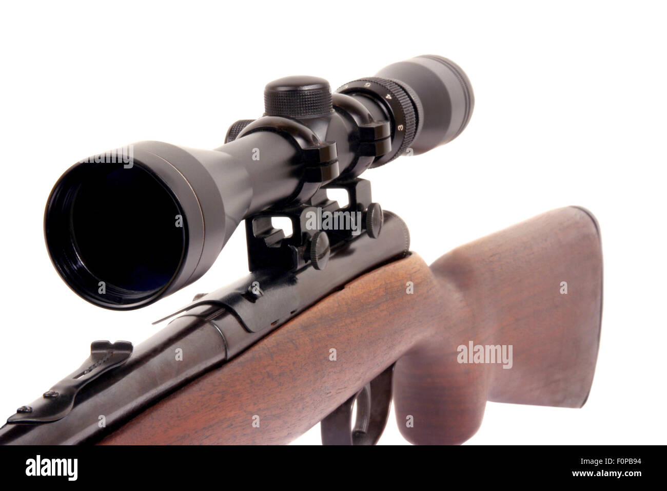 Macro shot of a rifle with a scope on top Stock Photo