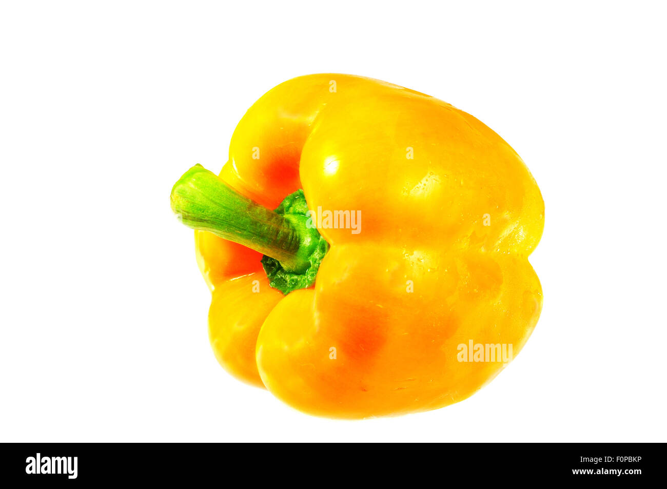 Single yellow-orange bell pepper isolated on white Stock Photo