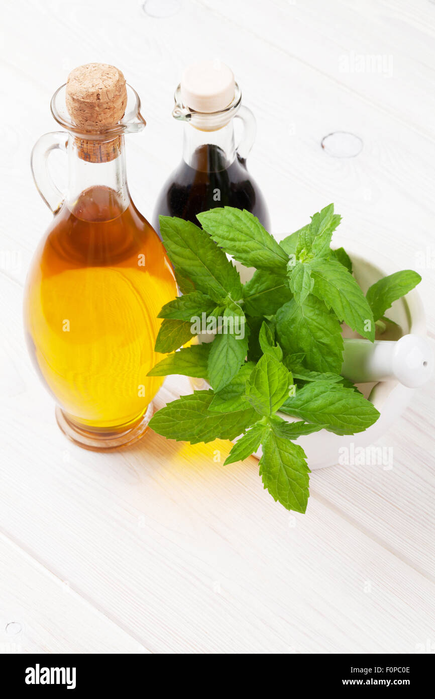 Fresh herbs and spices on wooden table Stock Photo