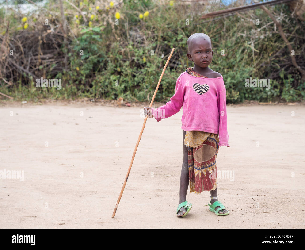 Small child in Maasai boma (village) in Tanzania, Africa. Stock Photo