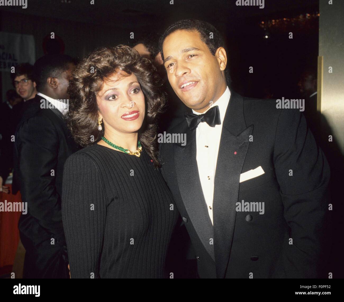 BRYANT GUMBEL with wife June Carlyn Baranco 1990.f9387. © Michael Stock