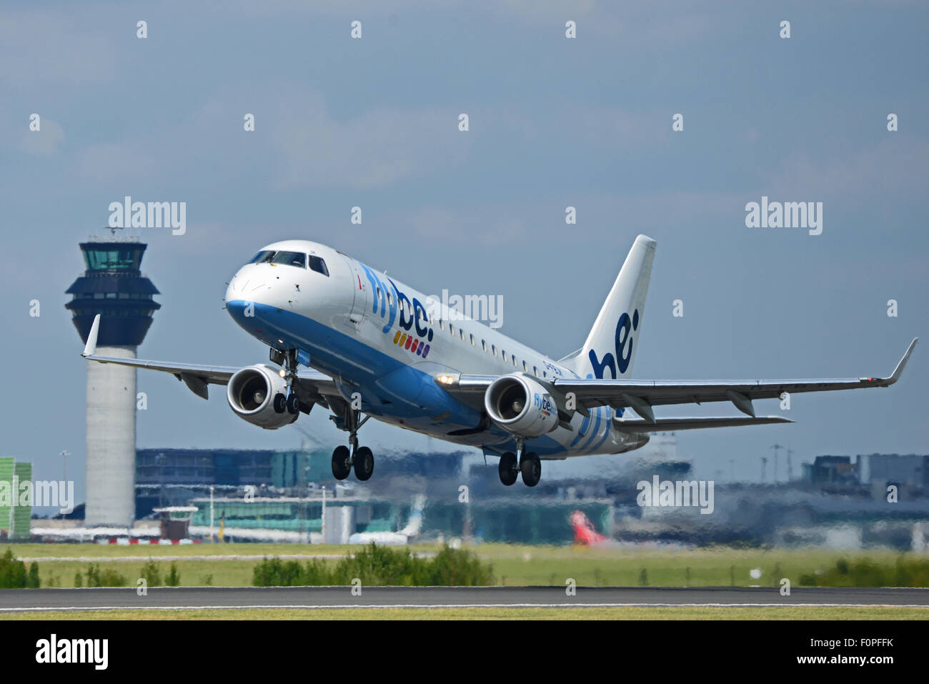 Flybe airliner jet Manchester Airport England uk departure Stock Photo