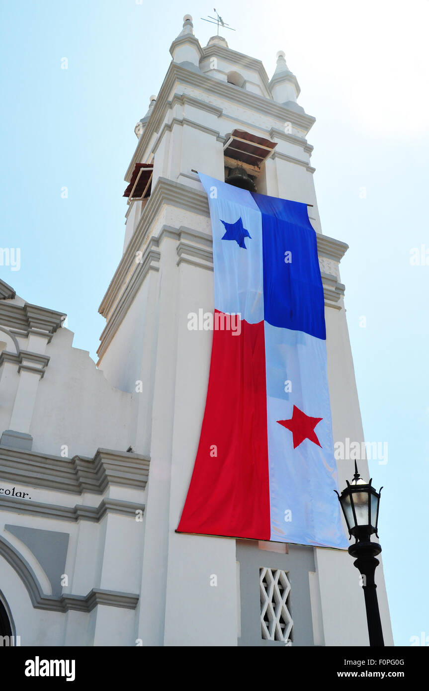 Church of San Atanasio tower covered with a huge Panamanian flag celebrating independance from Spain Stock Photo