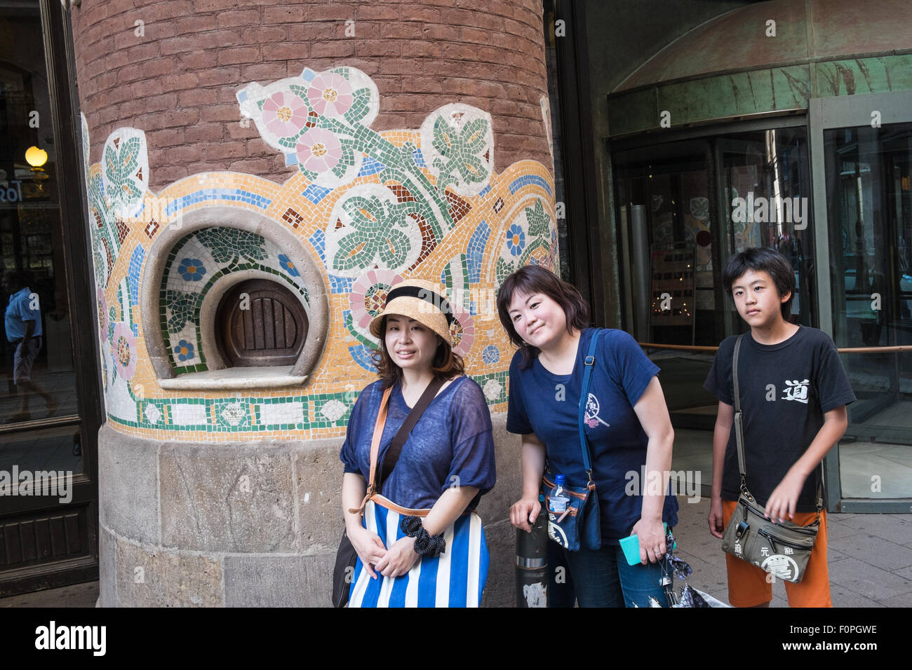 Japanese tourists at old ticket box office at Palau de la Musica Catalana,Palace of Catalan Music, Barcelona,Spain Stock Photo