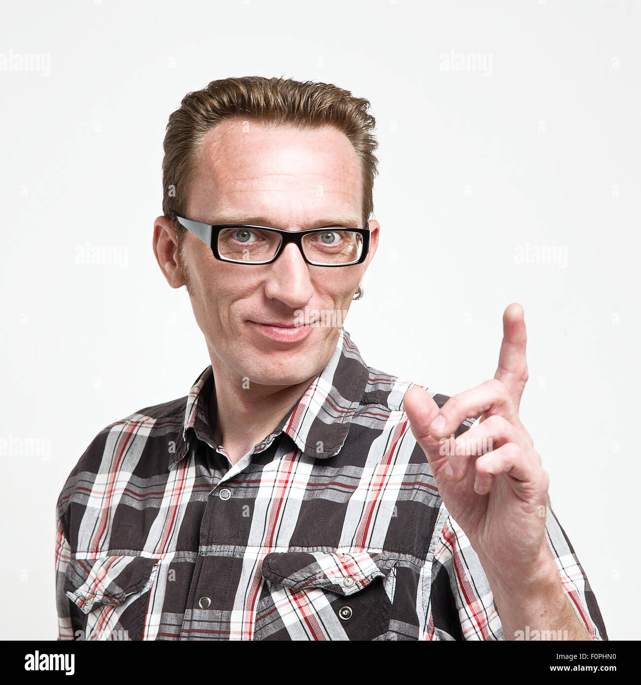 Hand raised index finger hi-res stock photography and images - Alamy