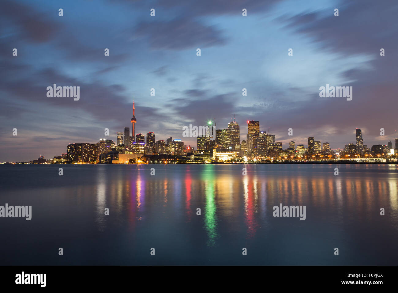 The Toronto Skyline at Night showing buildings and reflections in Lake ...