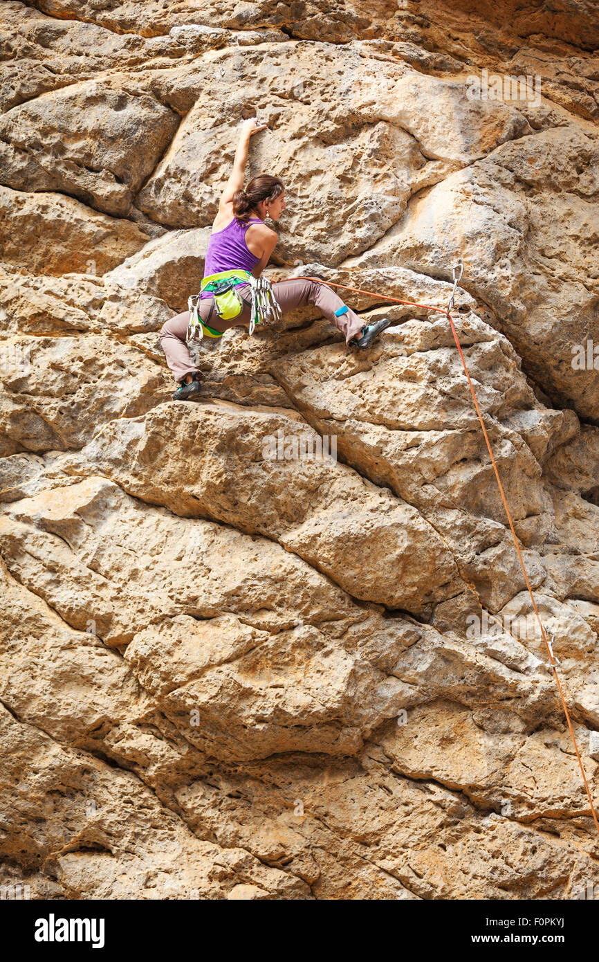 Young female rock climber on a cliff Stock Photo Alamy