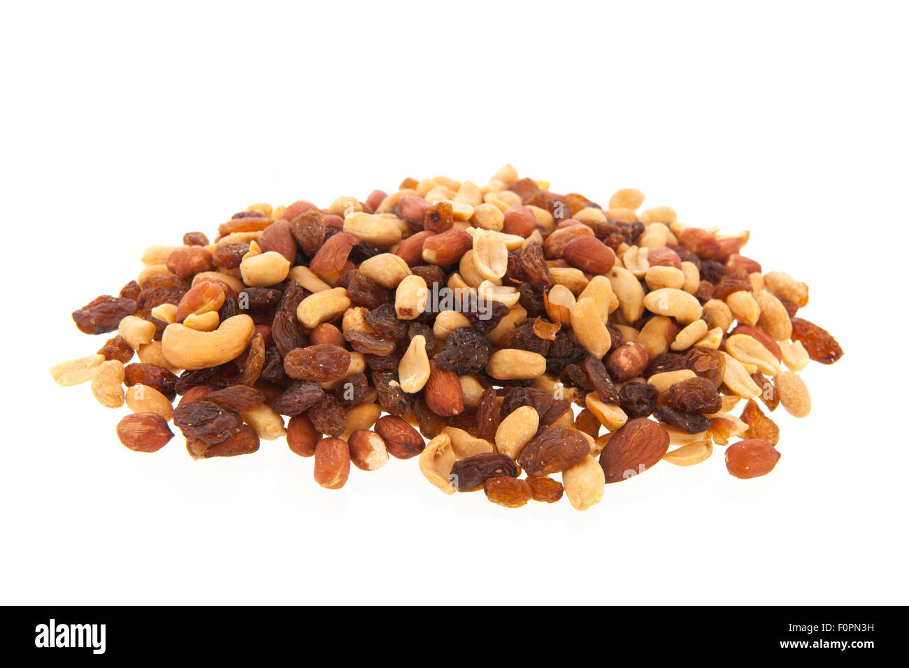 Mixed nuts and raisins isolated over white background Stock Photo