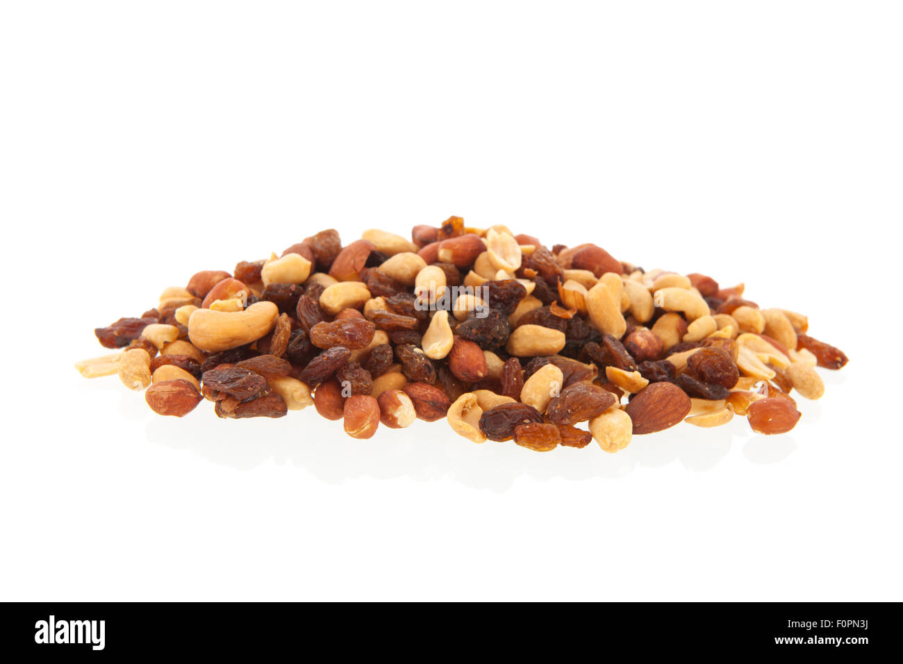 Mixed nuts and raisins isolated over white background Stock Photo