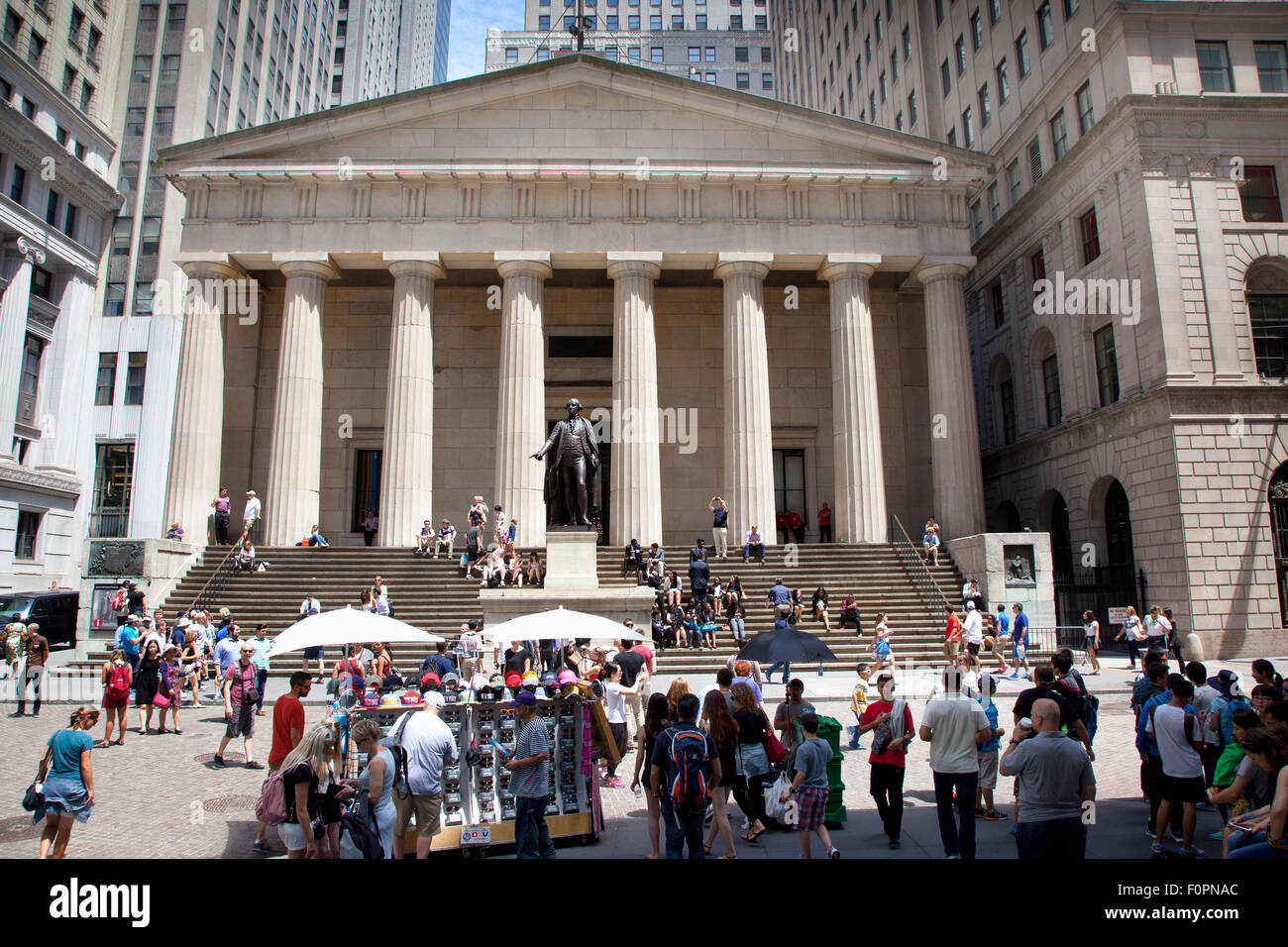 USA, New York State, New York City, Manhattan, Exterior of Federal Hall with statue of George Washington outside. Stock Photo