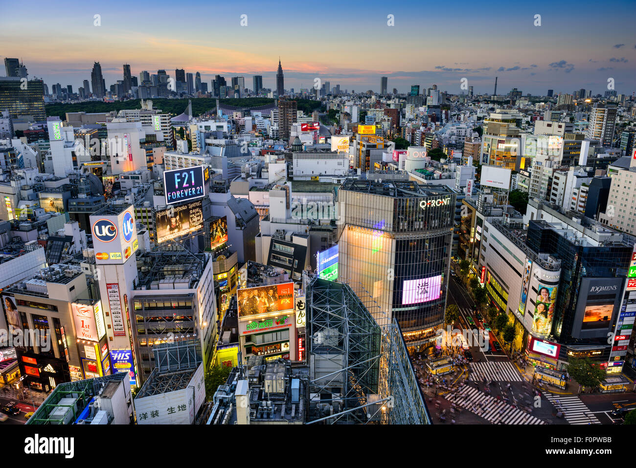 TOKYO, JAPAN - AUGUST 4, 2015: The Shibuya skyline at twilight. Shibuya is considered Tokyo's center for youth fashion and cultu Stock Photo