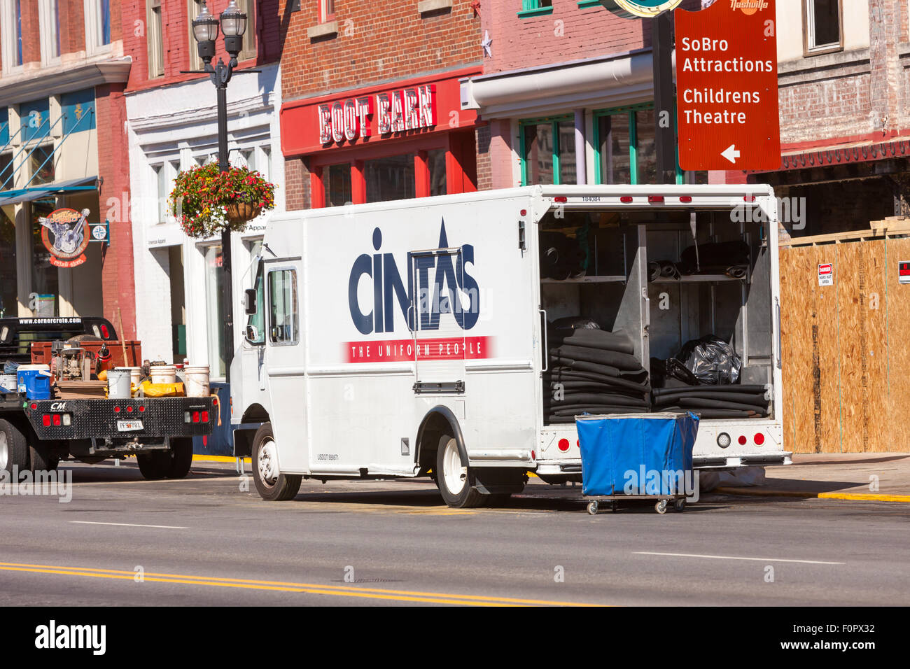 A Cintas truck makes a delivery in downtown Nashville, Tennessee. Stock Photo