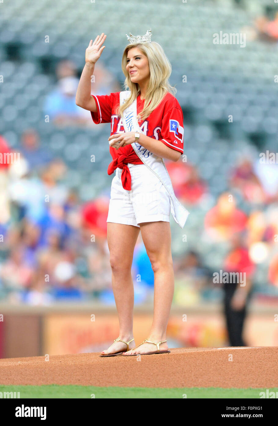 AUG 18, 2015: Miss Texas Shannon Sanderford throws out the first pitch before an MLB game between the Seattle Mariners and the Texas Rangers at Globe Life Park in Arlington, TX Seattle defeated Texas 3-2 Albert Pena/CSM Stock Photo