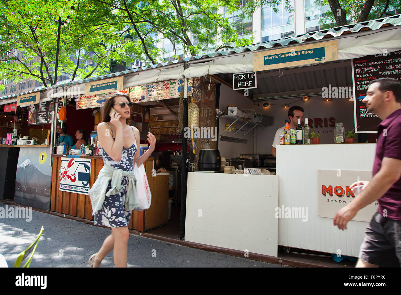 USA, New York State, New York City, Manhattan, Broadway Bites seasonal popup food stalls in Greeley Square Park. Stock Photo