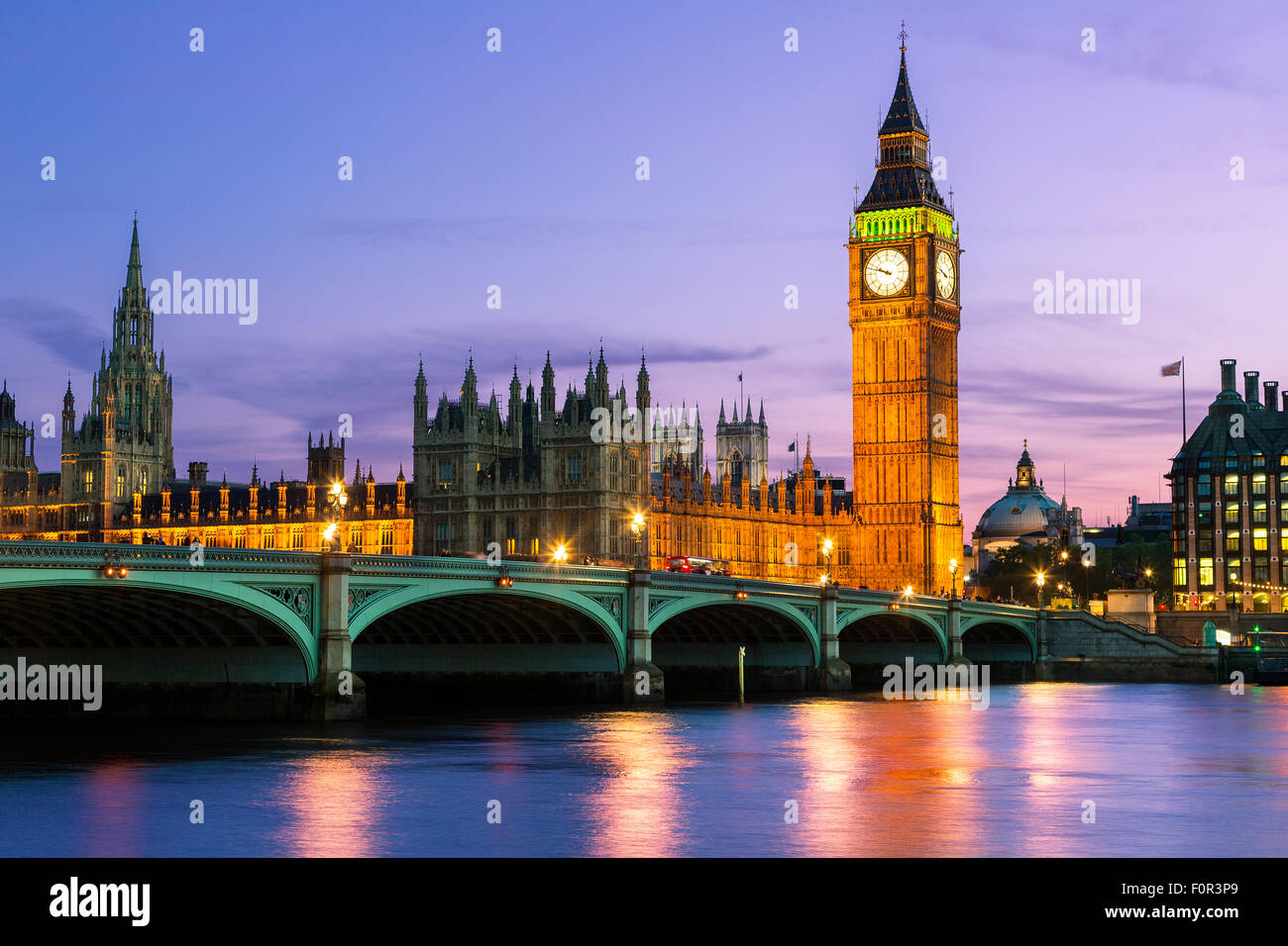 London, parliament building and Westminster Bridge at Dusk Stock Photo