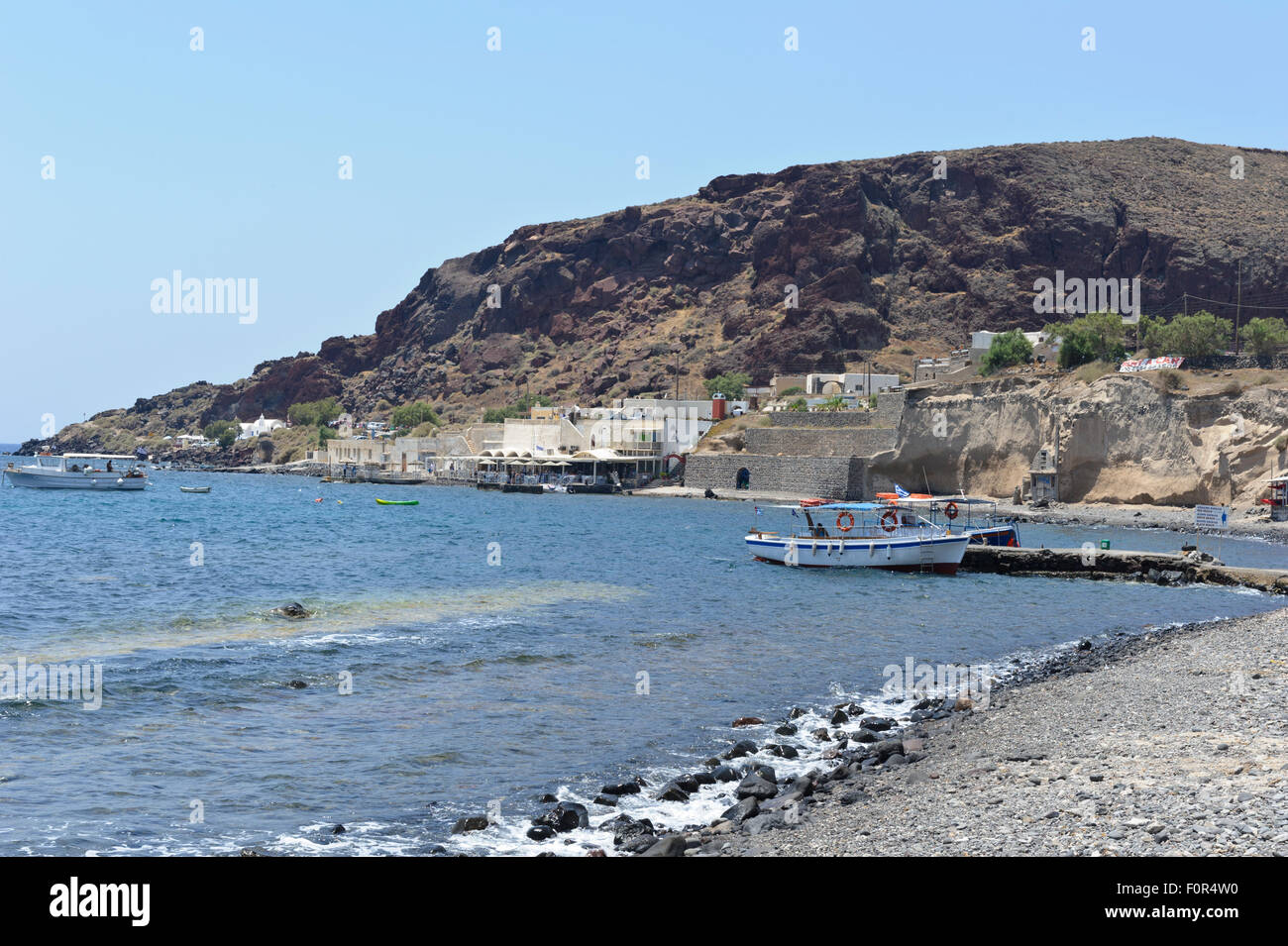 Akrotiri Beach With Pebbles And Rocks Santorini Greece - 