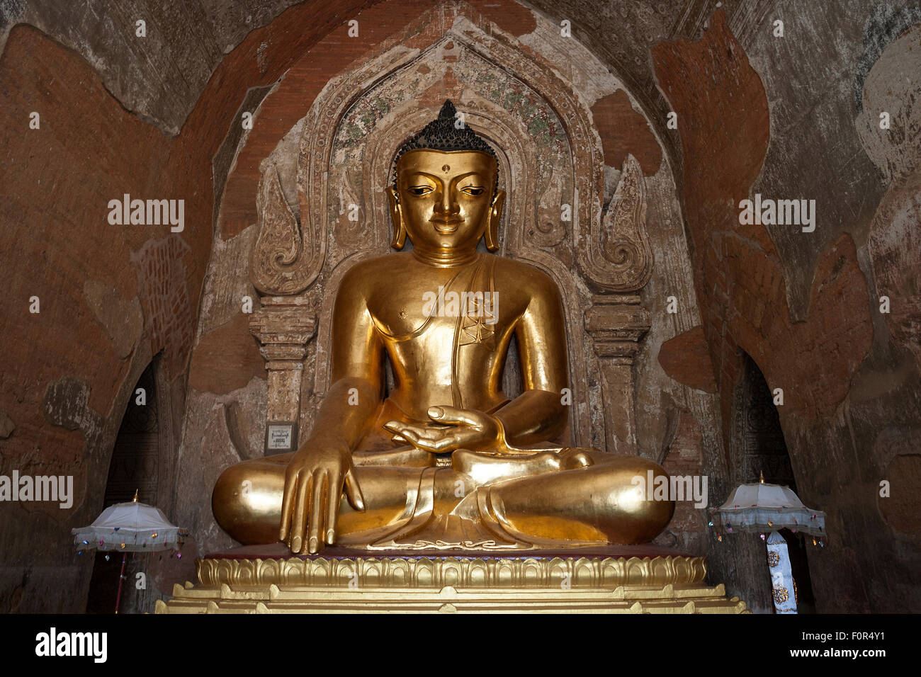 Seated gilded Buddha, Buddha statue, Ananda Temple, Bagan, Mandalay Division, Myanmar Stock Photo