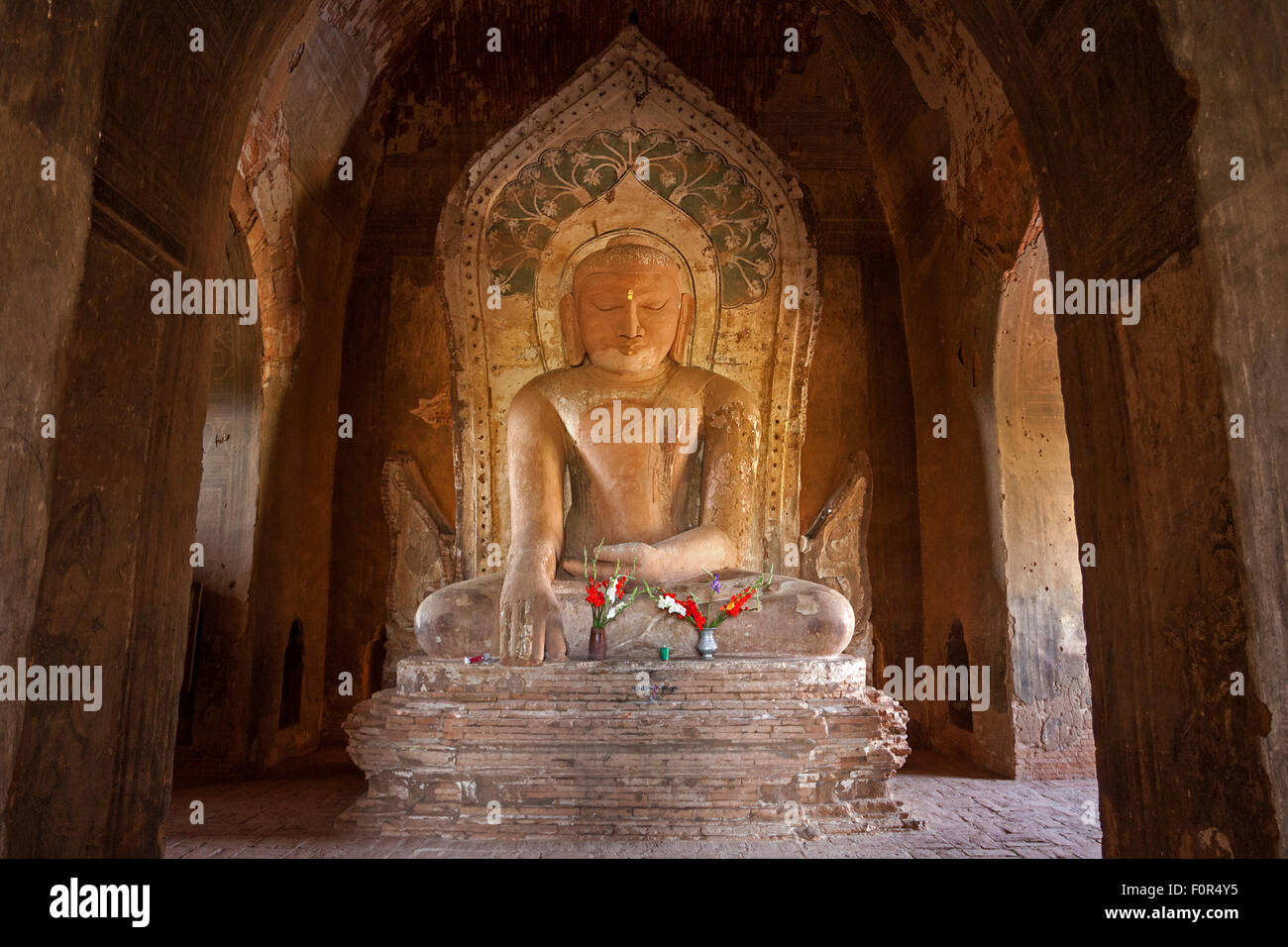 Seated Buddha stone statue, Ananda Temple, Bagan, Mandalay Division, Myanmar Stock Photo