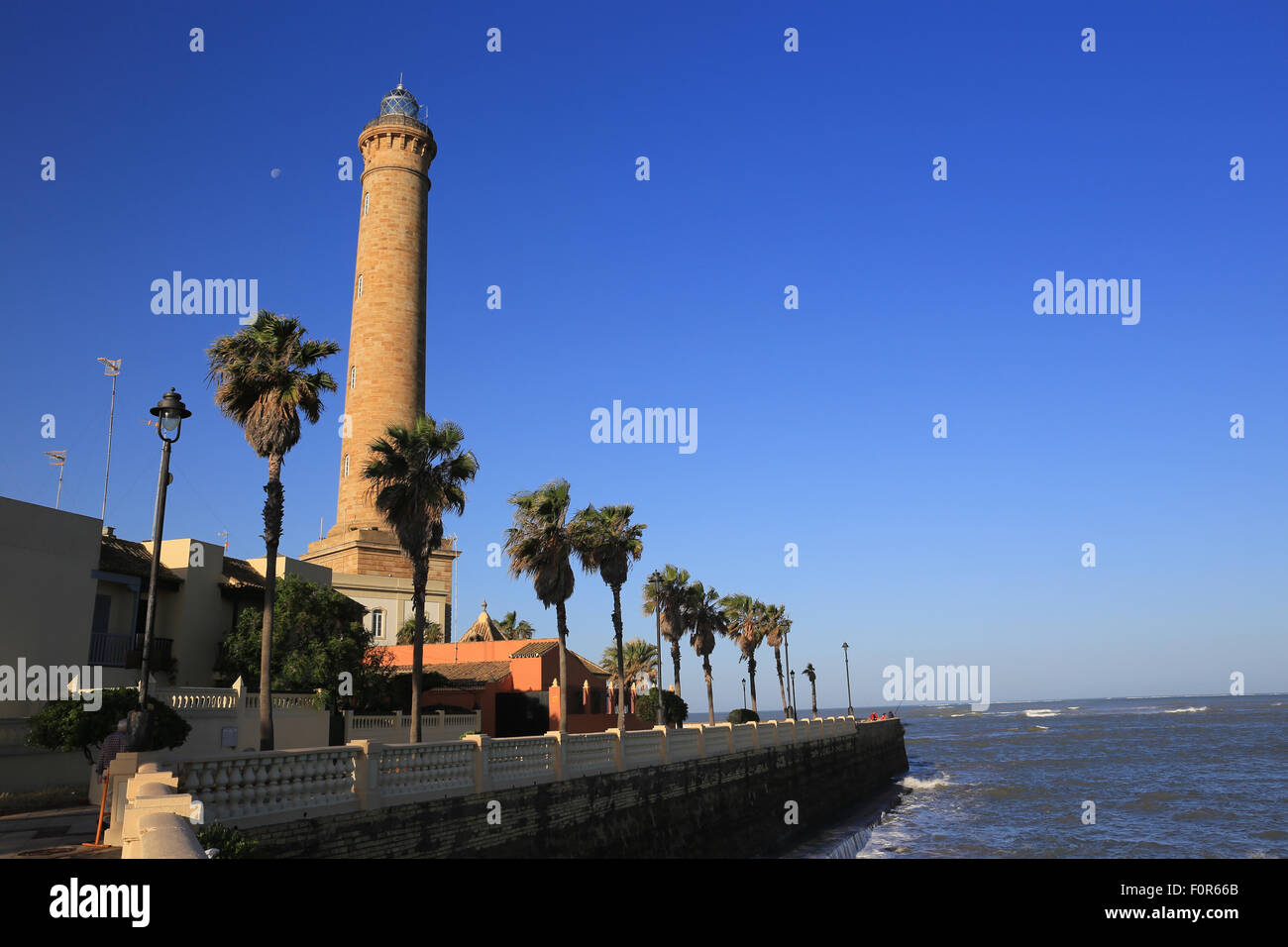 The lighthouse (Faro de Chipiona) at Chipiona, Cadiz, Andalucia, Spain. Stock Photo