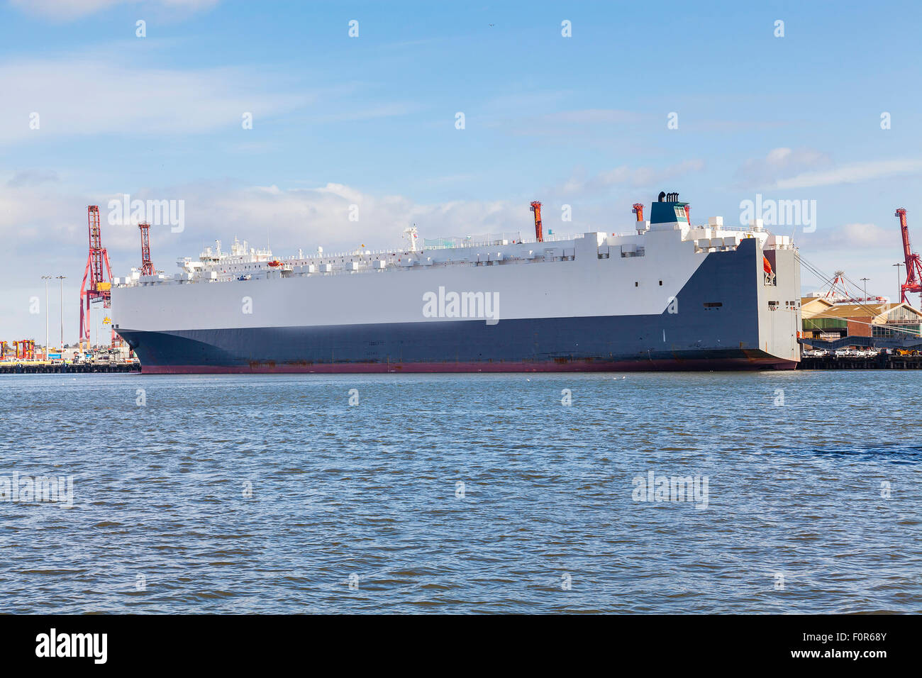 Car carrier at a port Stock Photo