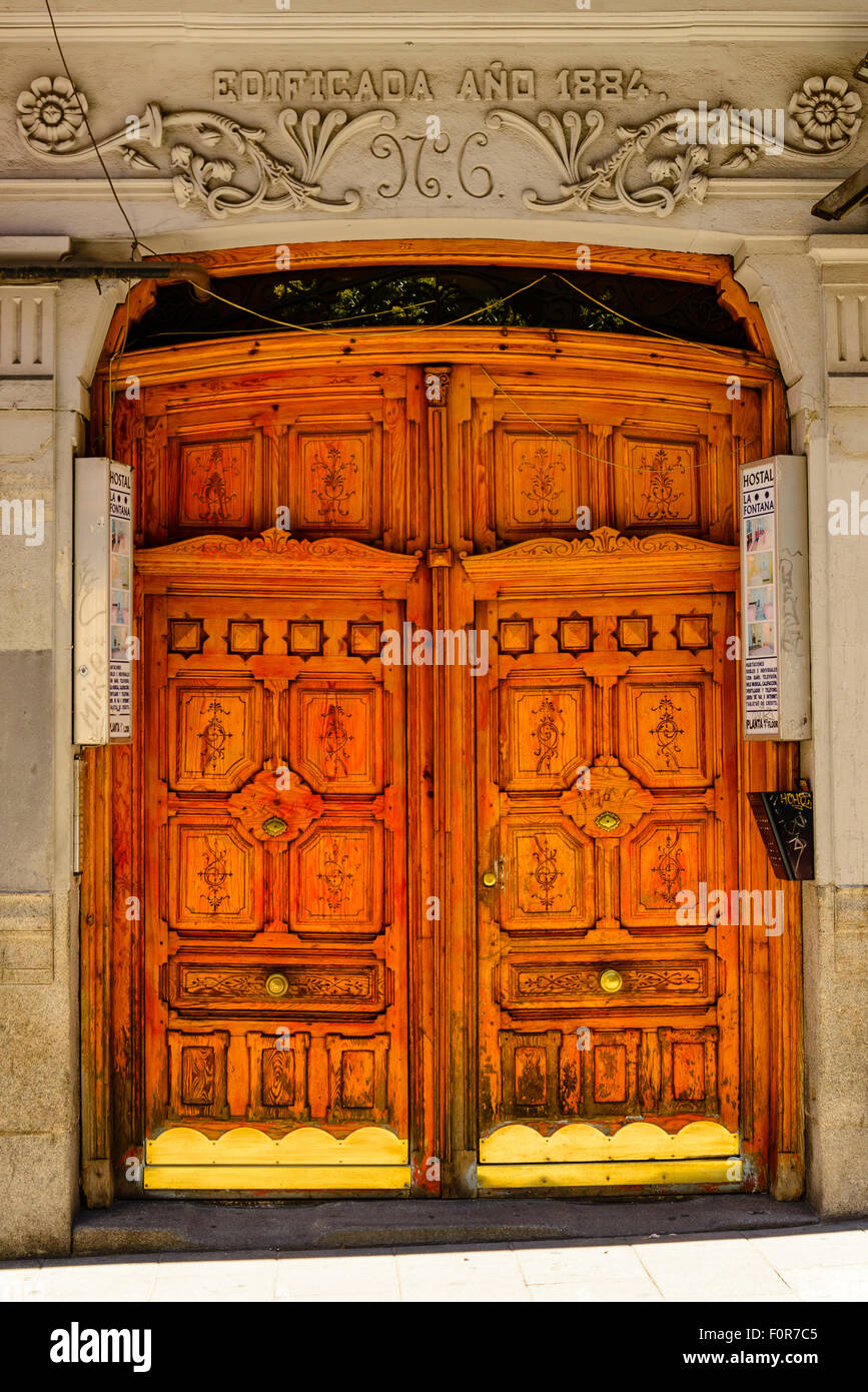 Ornately carved doorway in Calle Valverde Madrid Spain Stock Photo