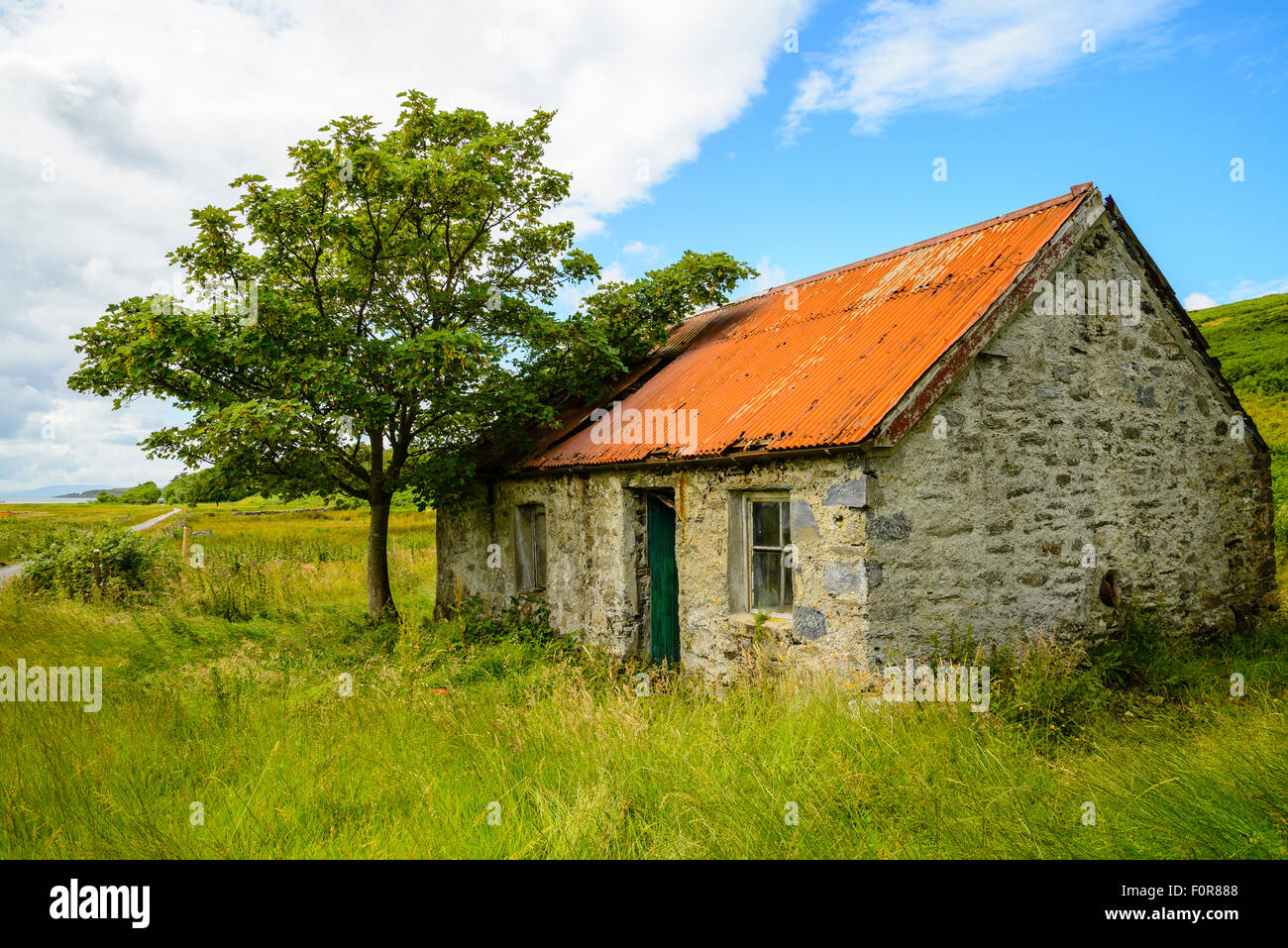 Derelict croft house beside Linnhe Mhuirich Loch Sween Argyll Scotland Stock Photo