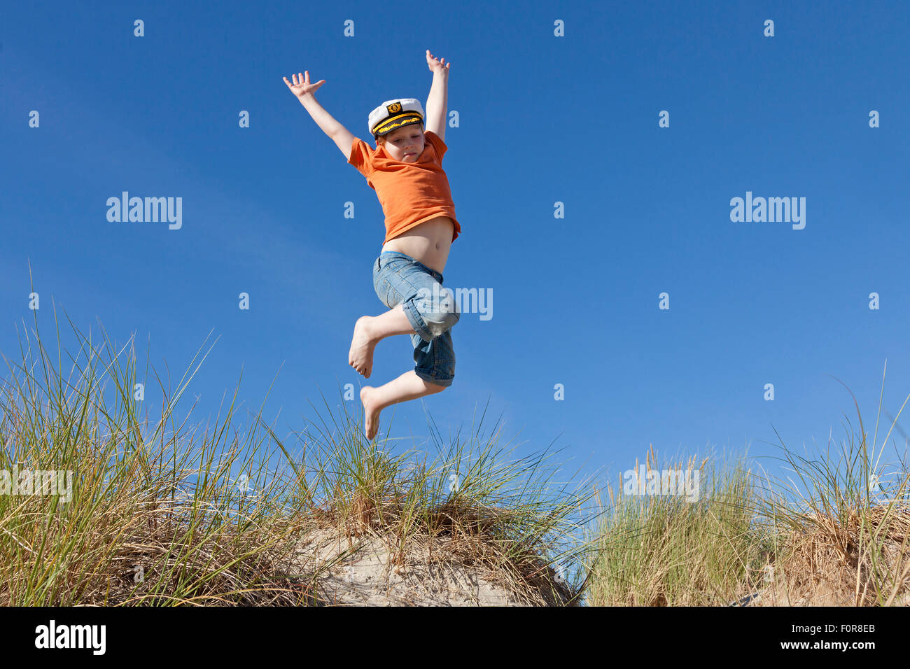 Jumping kids hi-res stock photography and images - Alamy