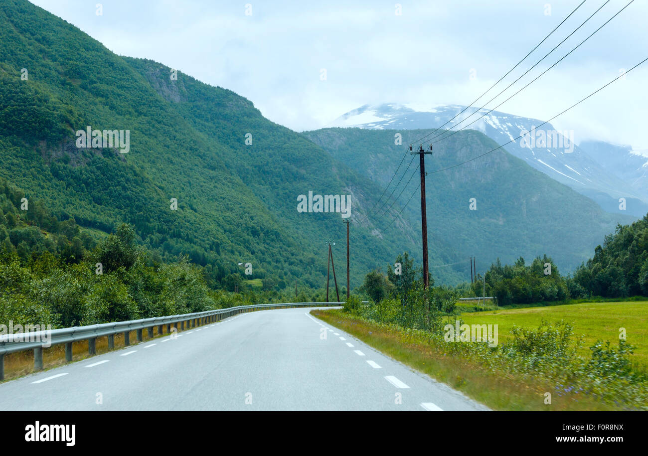Summer cloudy mountain landscape with road (Norway Stock Photo - Alamy