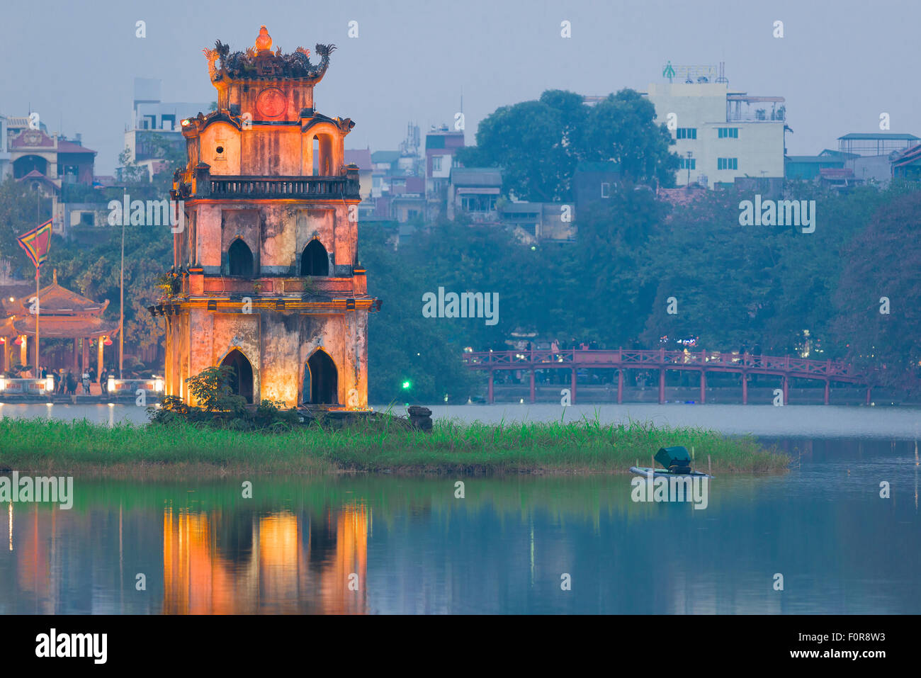 Hanoi Turtle Tower, view at dusk of the 19th century pavilion known as Turtle Tower sited in Hoan Kiem Lake in the center of Hanoi, Vietnam. Stock Photo