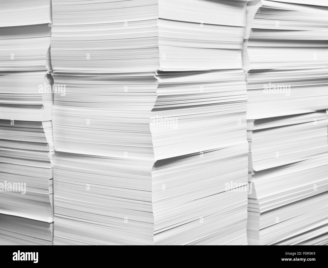 Stacks of freshly cut white paper Stock Photo
