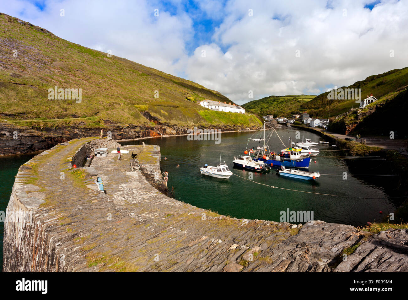 A collection of fishing boats in the harbour at Boscastle, north Cornwall, England, UK Stock Photo