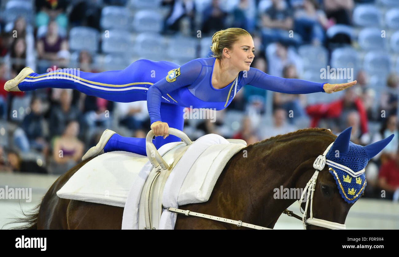 Aachen, Germany. 20th Aug, 2015. A member of the Swedish team "Svea  Vaulting" performs in the Vaulting Squads Compulsory Test during the FEI  European Championships in Aachen, Germany, 20 August 2015. Photo: