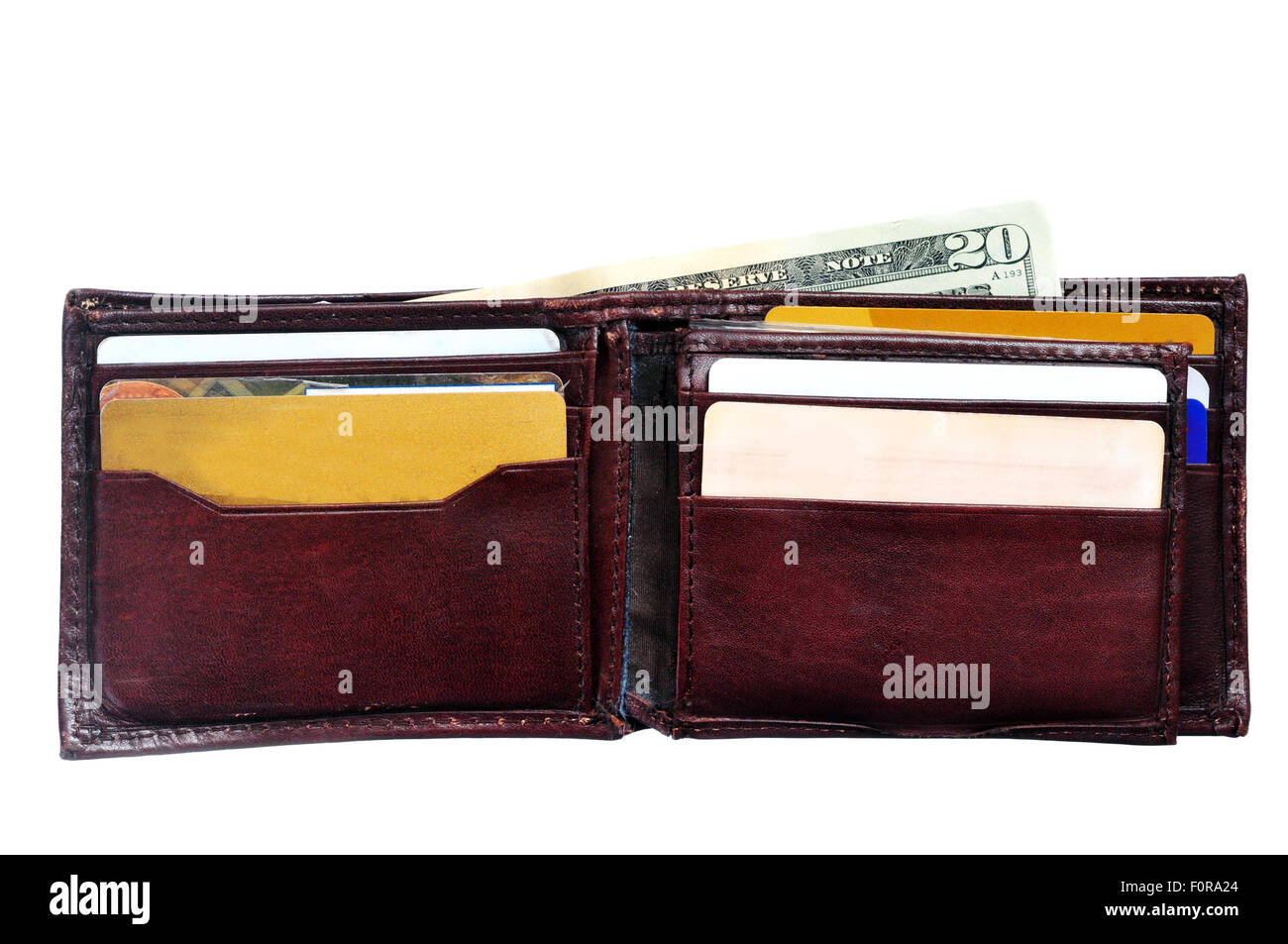 An open leather wallet with a twenty dollars  bill isolated on white Stock Photo