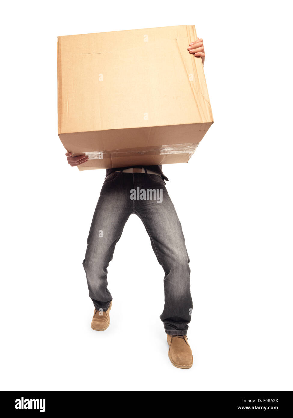 Man carrying heavy box Stock Photo