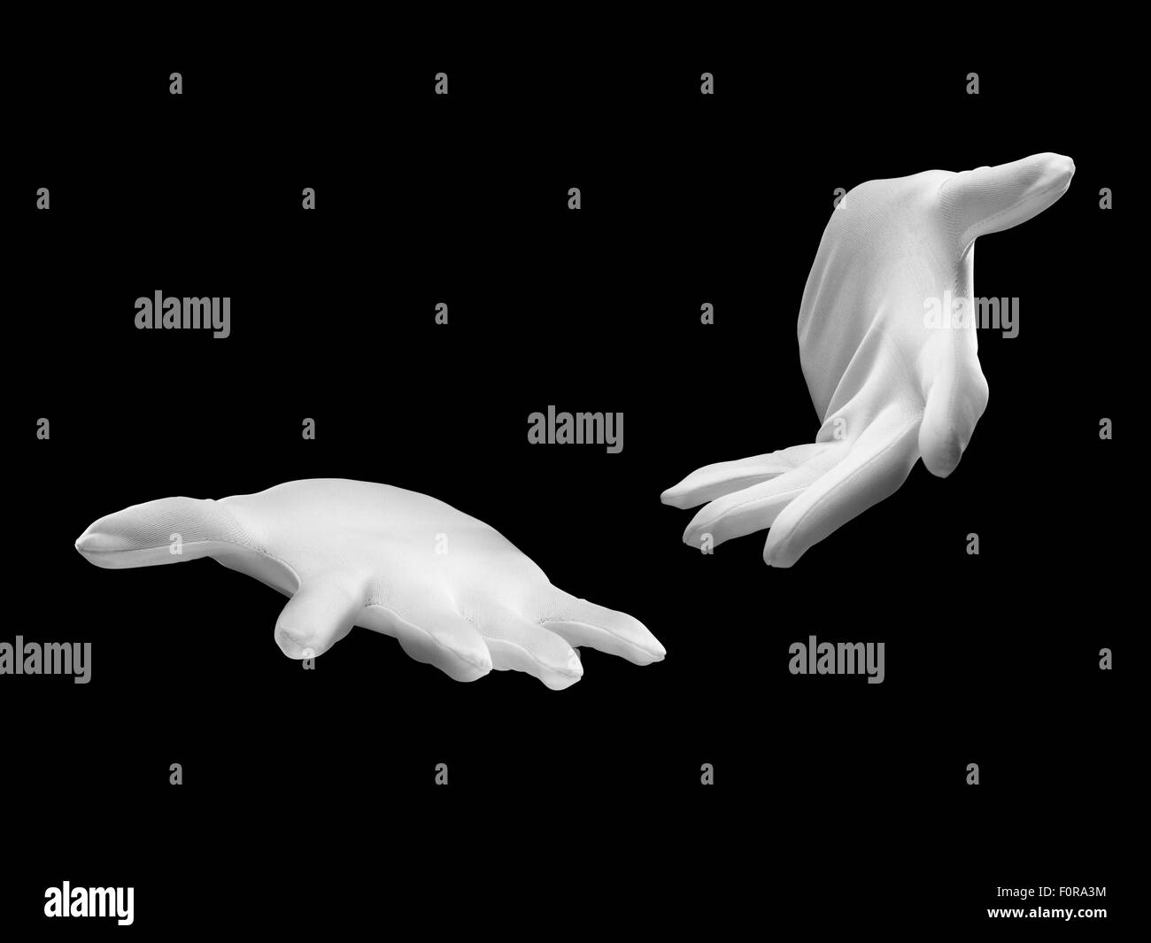 Magicians hands on black including clipping path Stock Photo