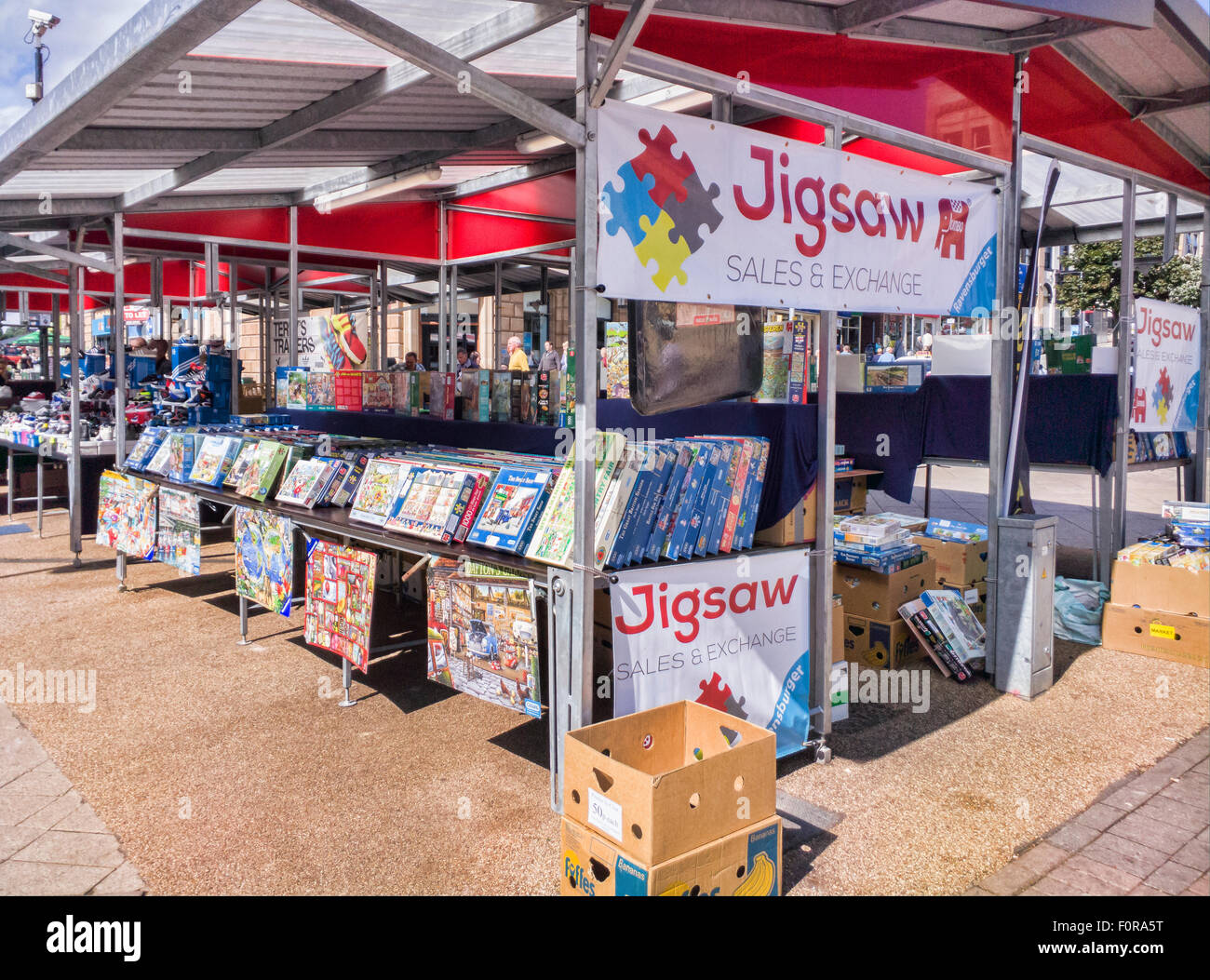 Jigsaw dealer's stall in a street market in Barnsley, South Yorkshire