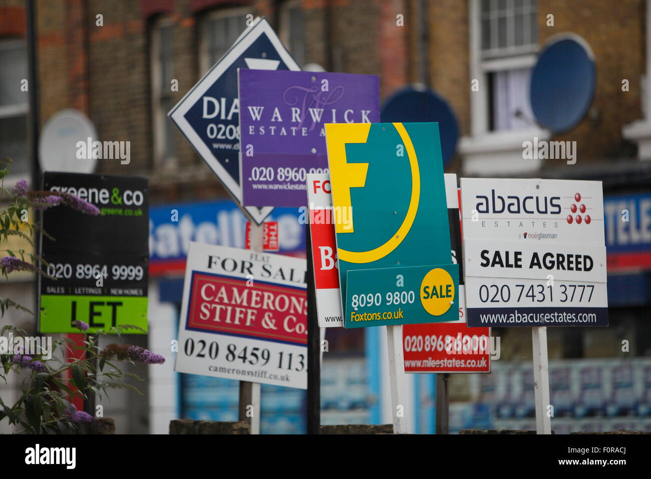 UK, London, Estate agent boards on the Harrow Road in North West London  ©Zute Lightfoot Stock Photo - Alamy