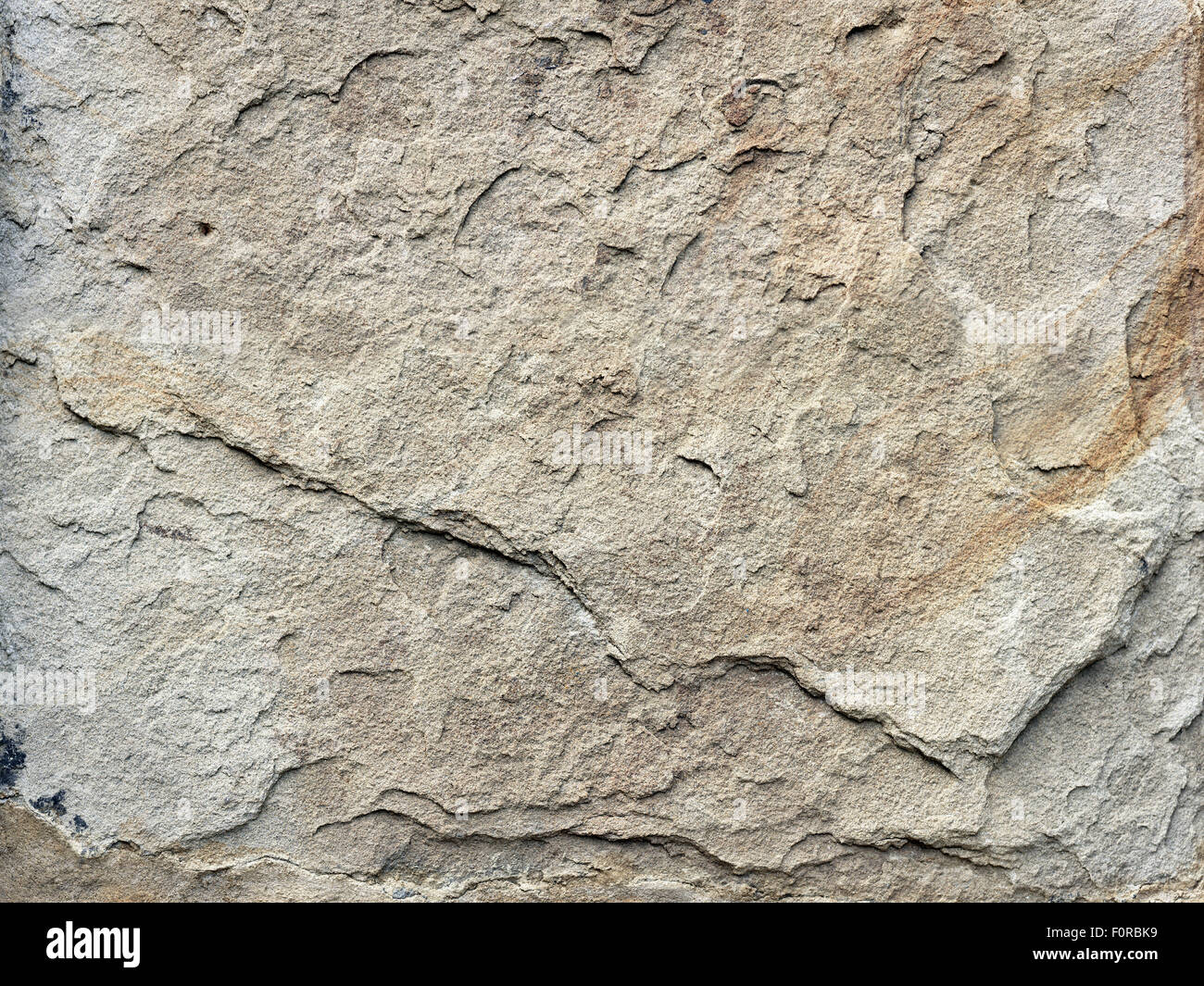 close up shot of old sand stone texture ideal for use as a background image Stock Photo