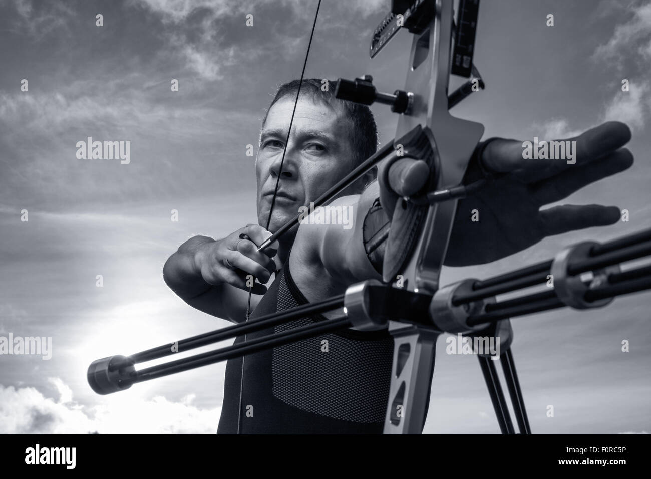 Person with bow and arrow hi-res stock photography and images - Alamy