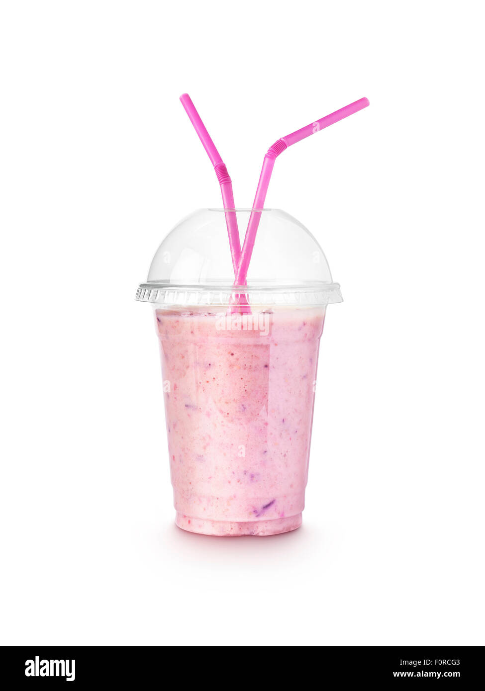 Simple shot of a single fruit smoothie in a take away plastic cup isolated on white with a clipping path and copy space for the Stock Photo