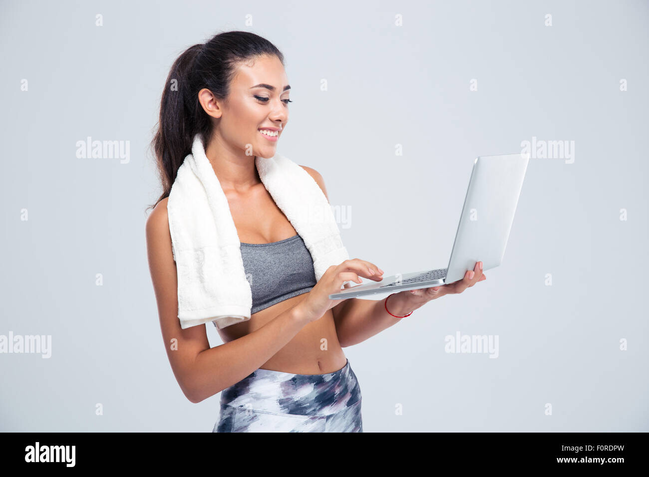 Fitness smile stretching woman hi-res stock photography and images - Alamy