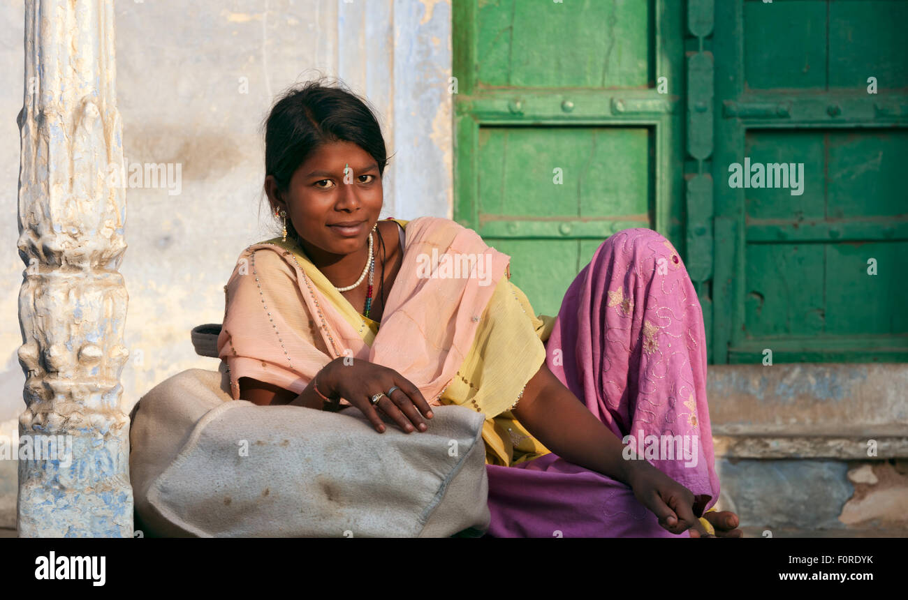Young smiling indian woman on the street in Pushkar,  Rajasthan, India Stock Photo