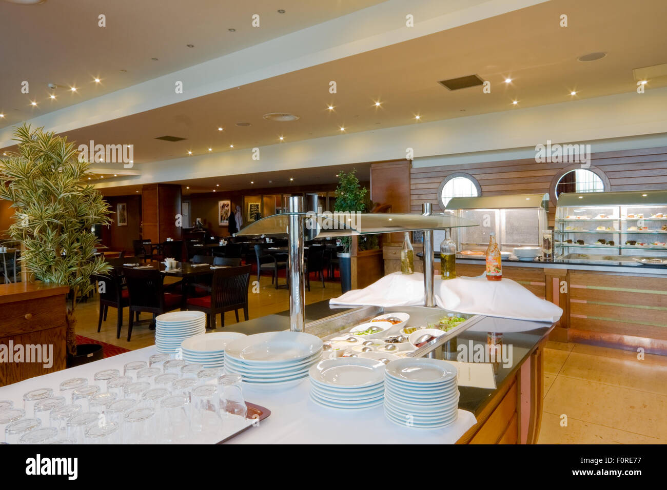 restaurant interior selfservice area with trays and clean crockery