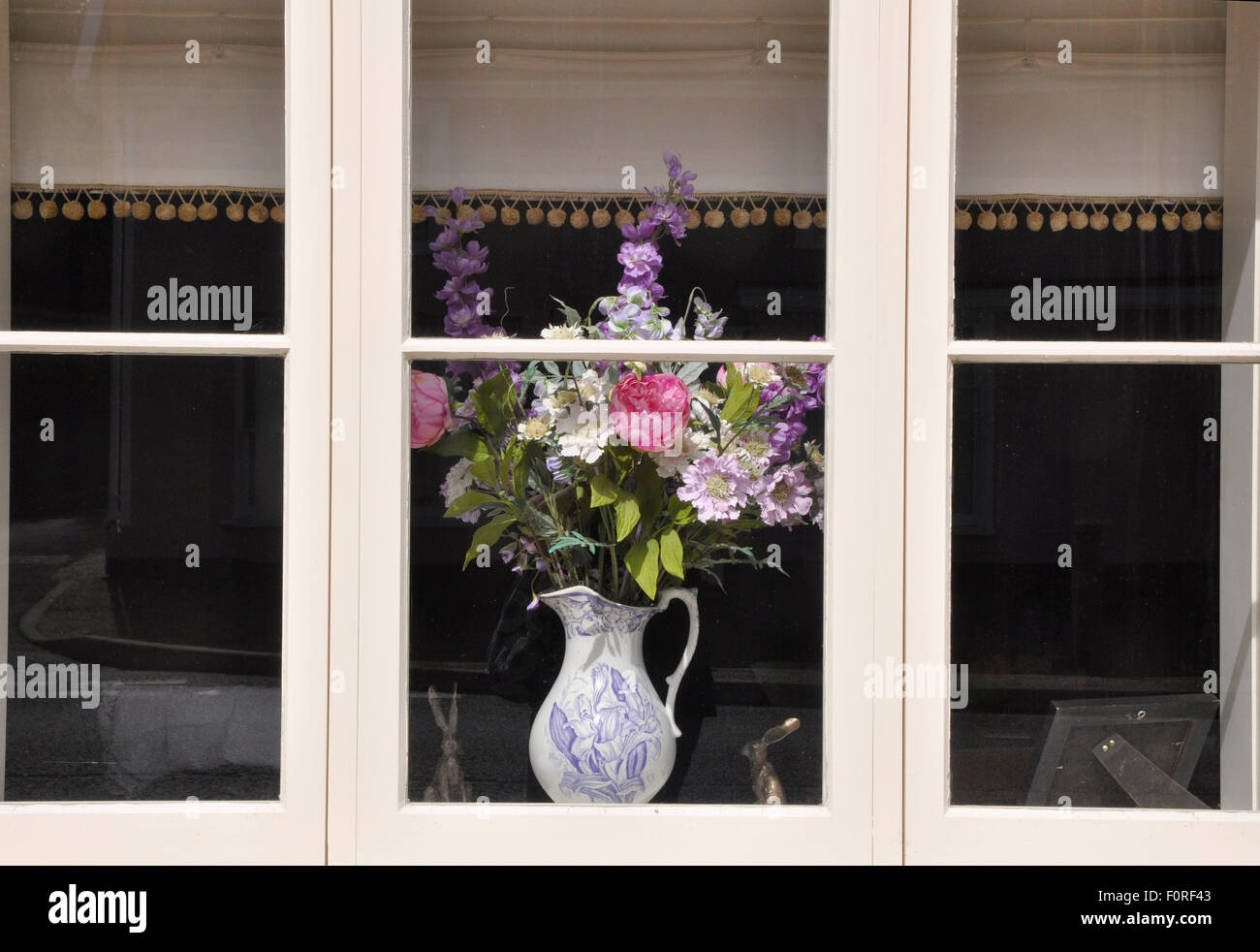 vase of flowers in window Stock Photo Alamy