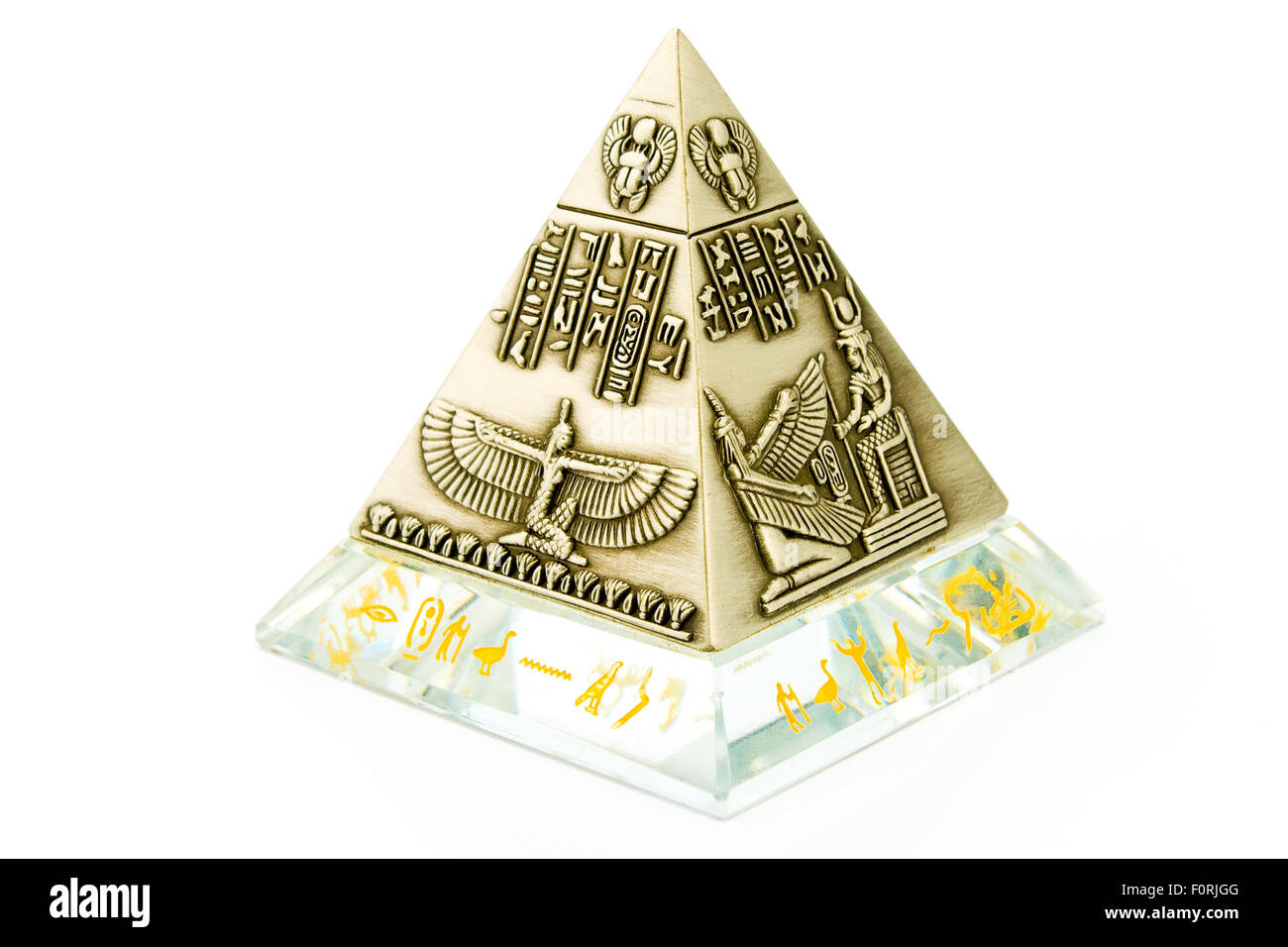 Brass Pyramid souvenir isolated on white Stock Photo