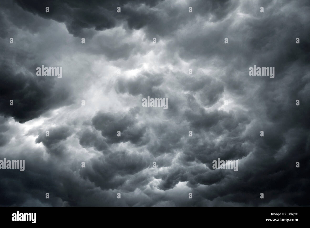 shot of dark and ominous storm clouds showing bad weather ahead Stock Photo