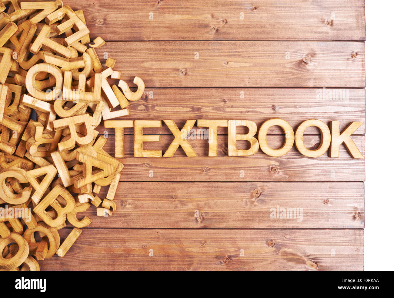 Word textbook made with wooden letters Stock Photo - Alamy