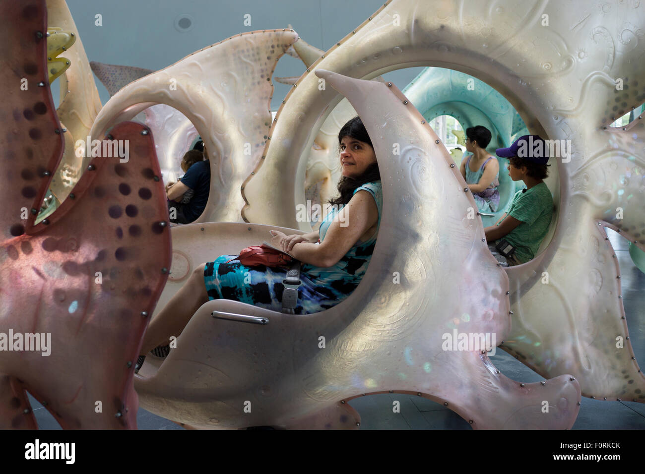At the SeaGlass carousel in Manhattan's Battery Park, riders sit inside